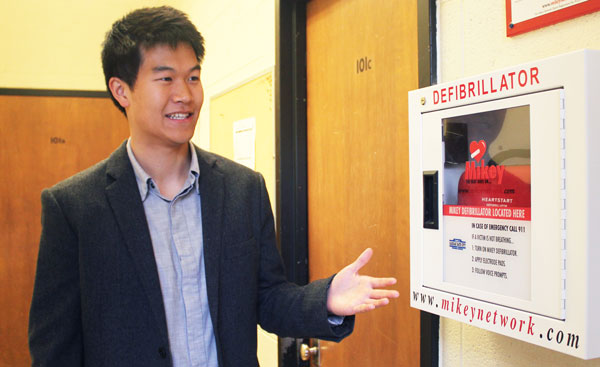 Graduate student Christopher Sun is part of a team researching and optimizing the distribution of artificial electronic defibrillators (AEDs) in Toronto. (Photo: Liz Do)