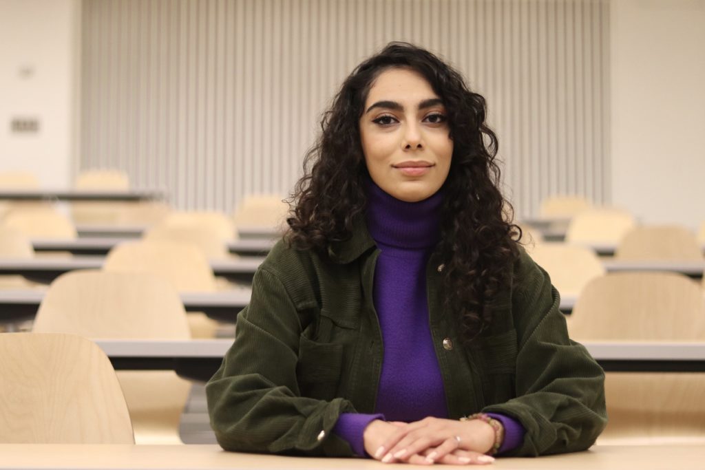 Photo of Newsha Haghgoo in a lecture hall.