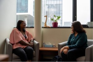 A photo of a therapist meeting with a patient. U of T Engineering undergraduate researchers are working with Professor Michael Guerzhoy (MIE, EngSci) to use AI to help mental health professionals treat speech disfluency. (Photo: Matthew Dochstader)