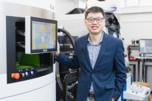 Professor Yu Zou (MSE) will be leveraging self-driving labs to accelerate his research focused on the development of improved materials for joint replacements. (Photo: Neil Ta)